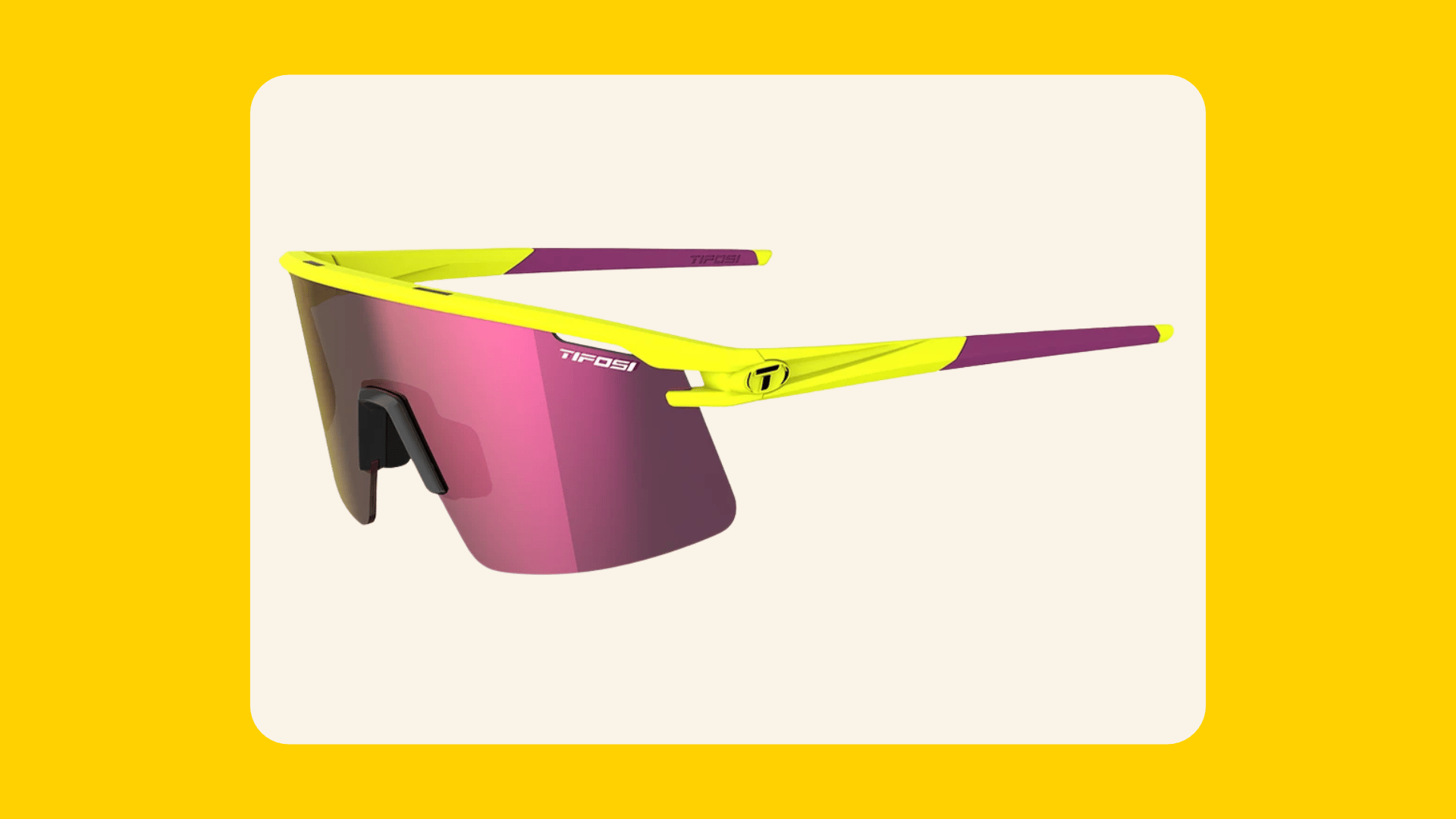 Tifosi sunglasses with a neon yellow and purple frame and pink mirrored shield lens