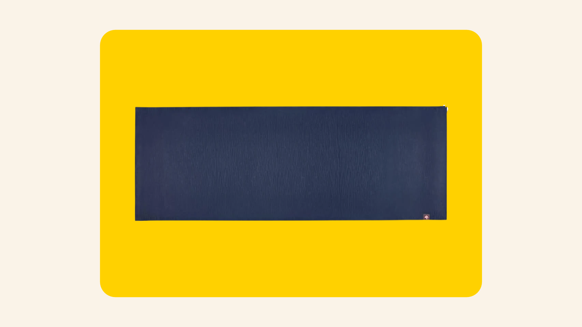Rolled-out dark navy Manduka eKO yoga mat