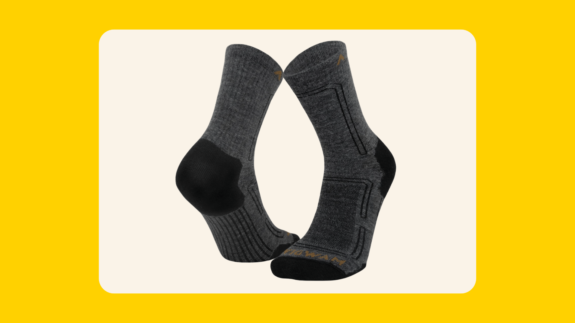 Pair of dark gray Wigwam alpaca wool mid-crew socks with black heels and toes