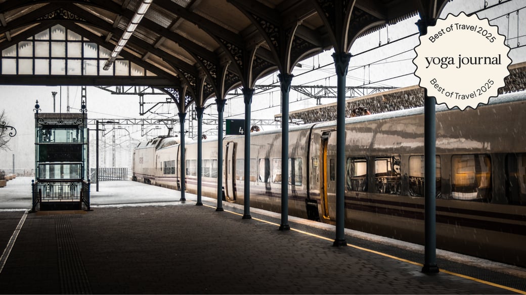 9 Simple Stretches You Can Do From Any Train, Plane, or Automobile