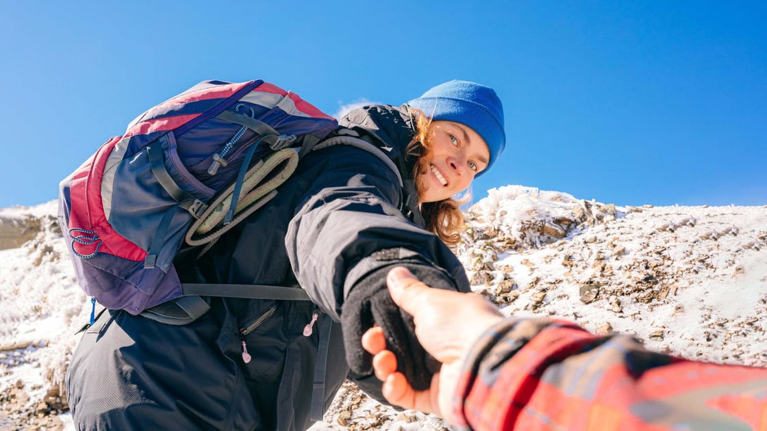hiker-offering-hand