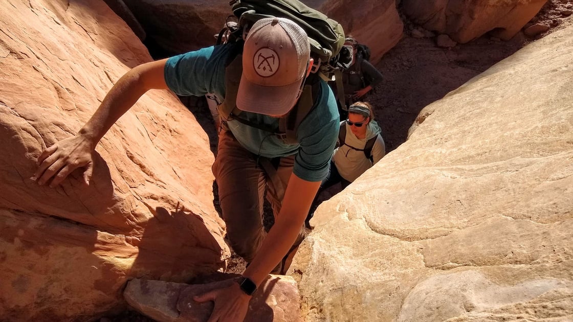 hiker-scaling-rock-bears-ears