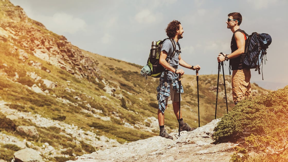 hikers-talking-on-rock-1