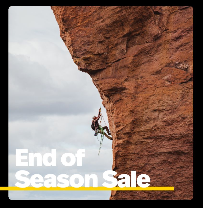 End of Season Sale. Image: a rock climber on the side of a sandstone cliff. 