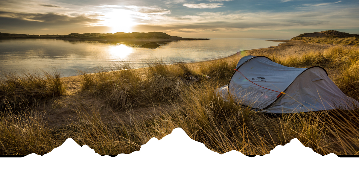 Image: a tent by a lake