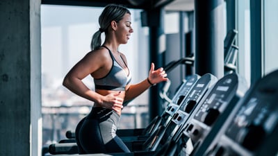 woman working out treadmill