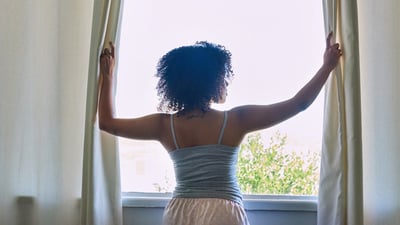 woman-looking-out-window